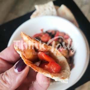 Eggplant, roasted peppers, garlic, and more coated with paprika make the perfect dip to serve with pita bread