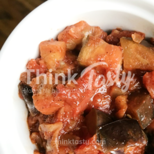 Chunks of eggplant tossed with tomato sauce and chili powder make a warm, filling side dish or topping