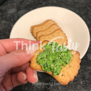 Pesto made with peas, cilantro, garlic, and parmesan