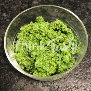 Pesto made with peas, cilantro, garlic, and parmesan