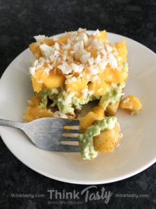 Spicy pineapple mashed avocado diced mango and chopped macadamia nuts