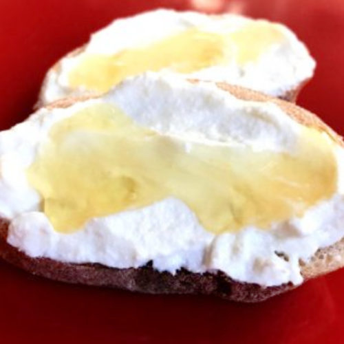 lemon flavored ricotta on toast with honey