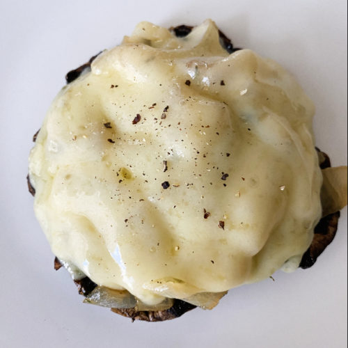 portabella topped with caramelized onion and swiss cheese