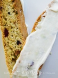 Cranberry Pistachio Biscotti with a White Chocolate Glaze